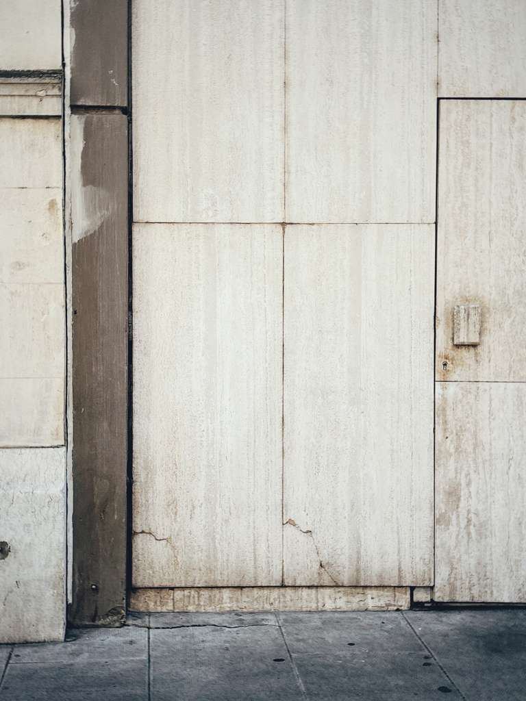 a door in white wall