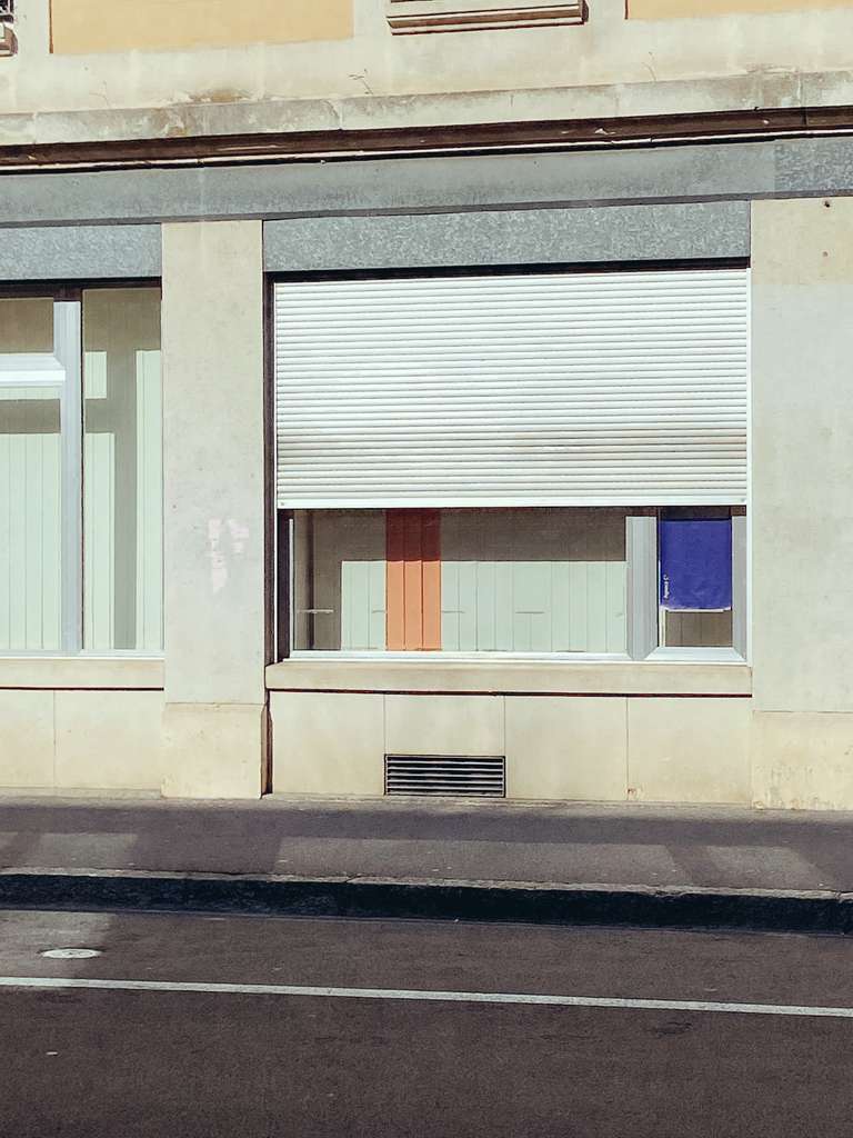 glass storefront with colors