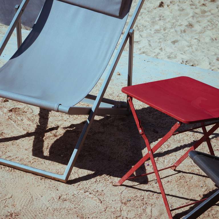 red chair in sand